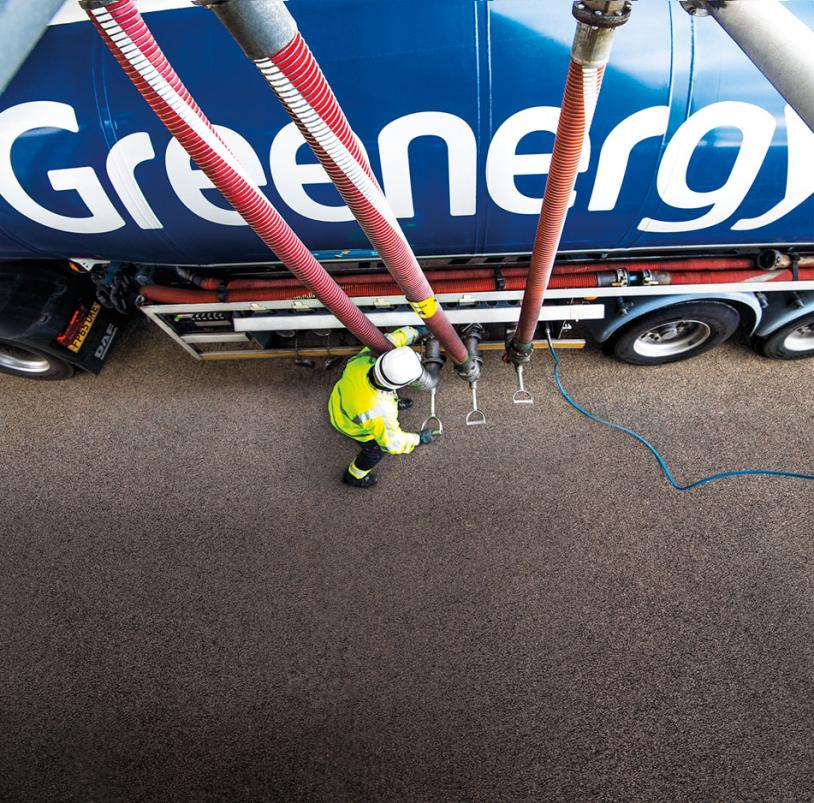 Working refueling a Greenergy truck